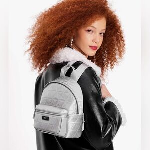 Kate Spade Sam Icon Silver Small Quilted Satin Backpack EUC
